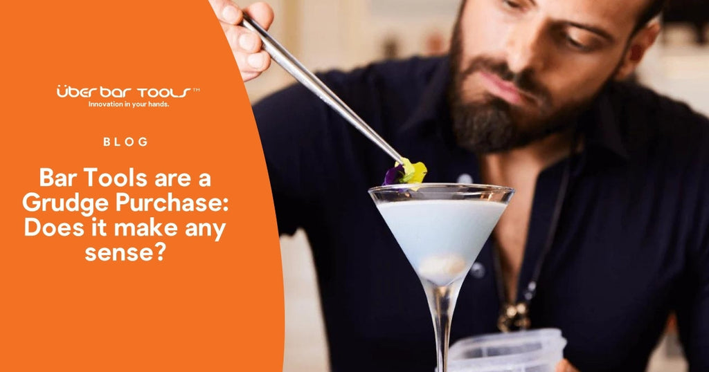 Bartender using a long tweezer to garnish a cocktail with an edible flower