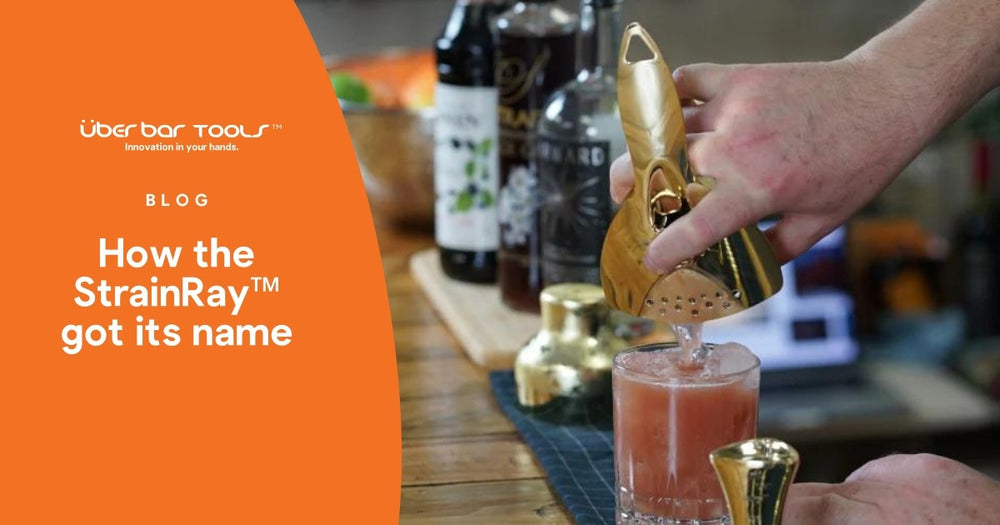 Cocktail drink being poured to a glass using the StrainRay strainer