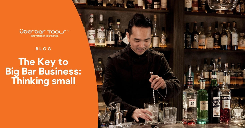 Bartender using a swizzle stick to make a cocktail